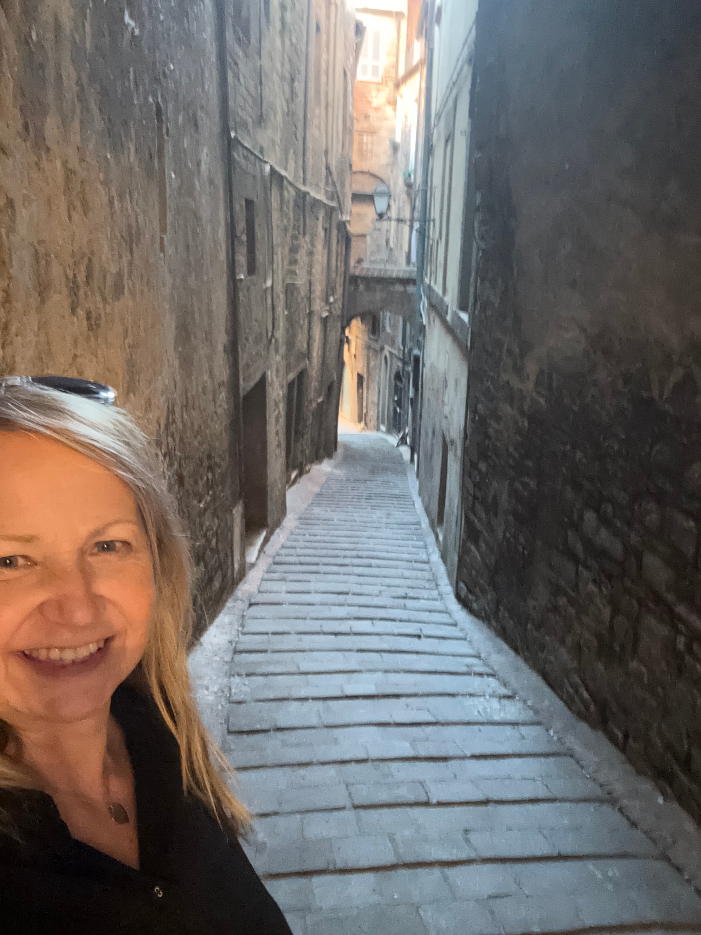 Sandy in a hilltown backstreet in Italy